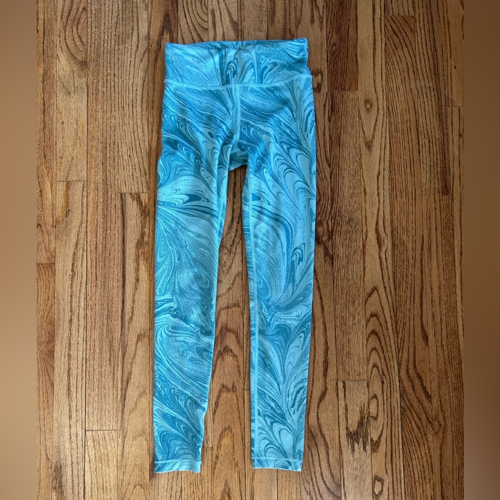 Athleta size 8-10 leggings. Like new condition. Teal swirl